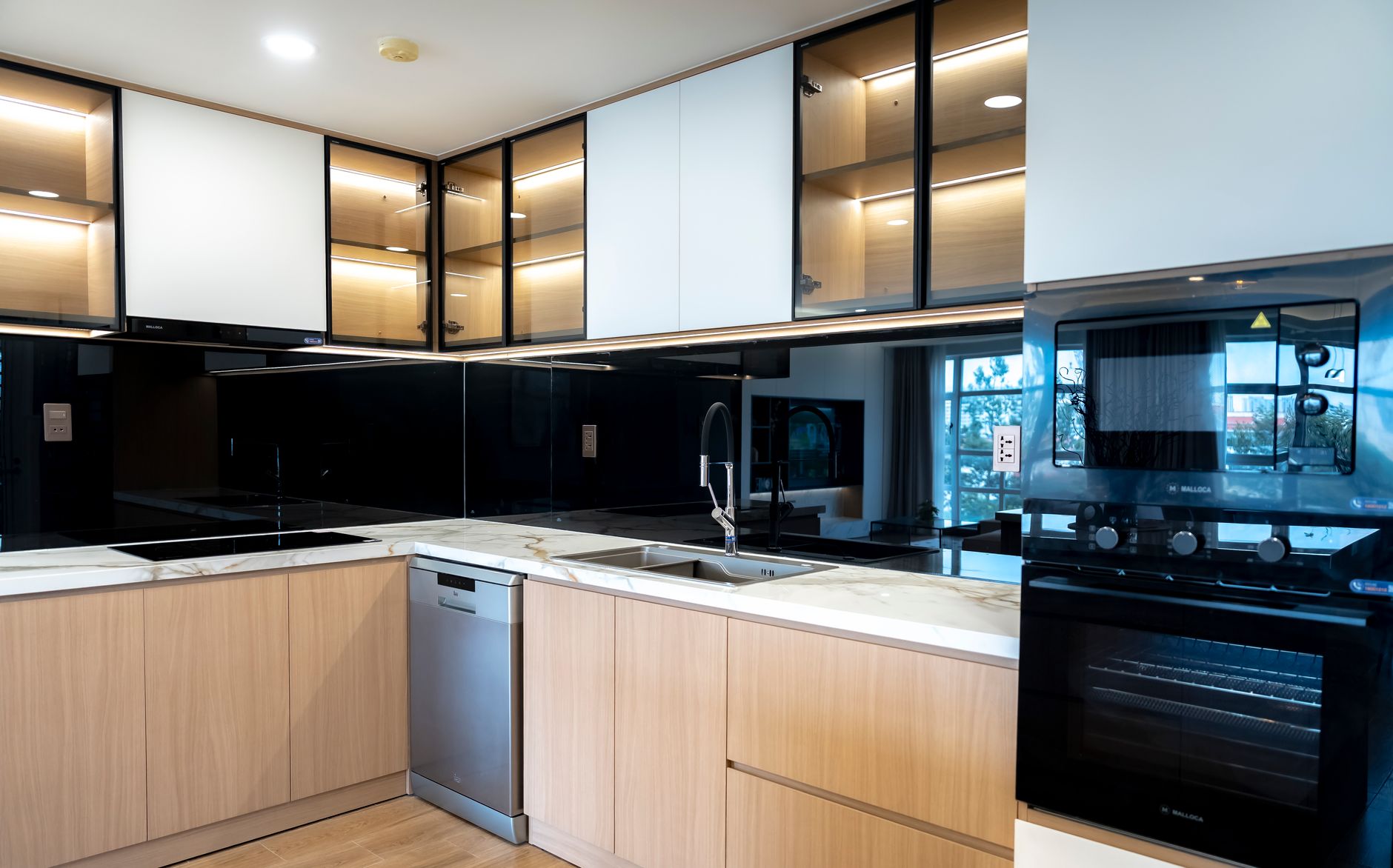 Contemporary kitchen design featuring high-end appliances and minimalist decor.